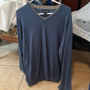 This is Pierre Cardin sweater and still has a tag, Bijou Blue is the color.